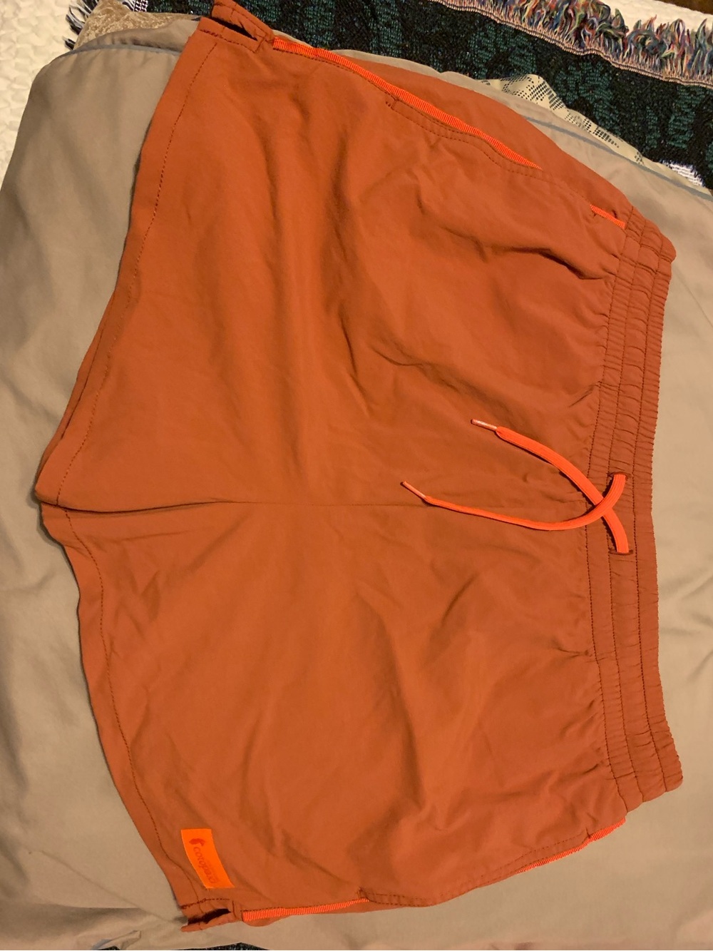 S Cotopaxi burnt orange shorts. New without tags